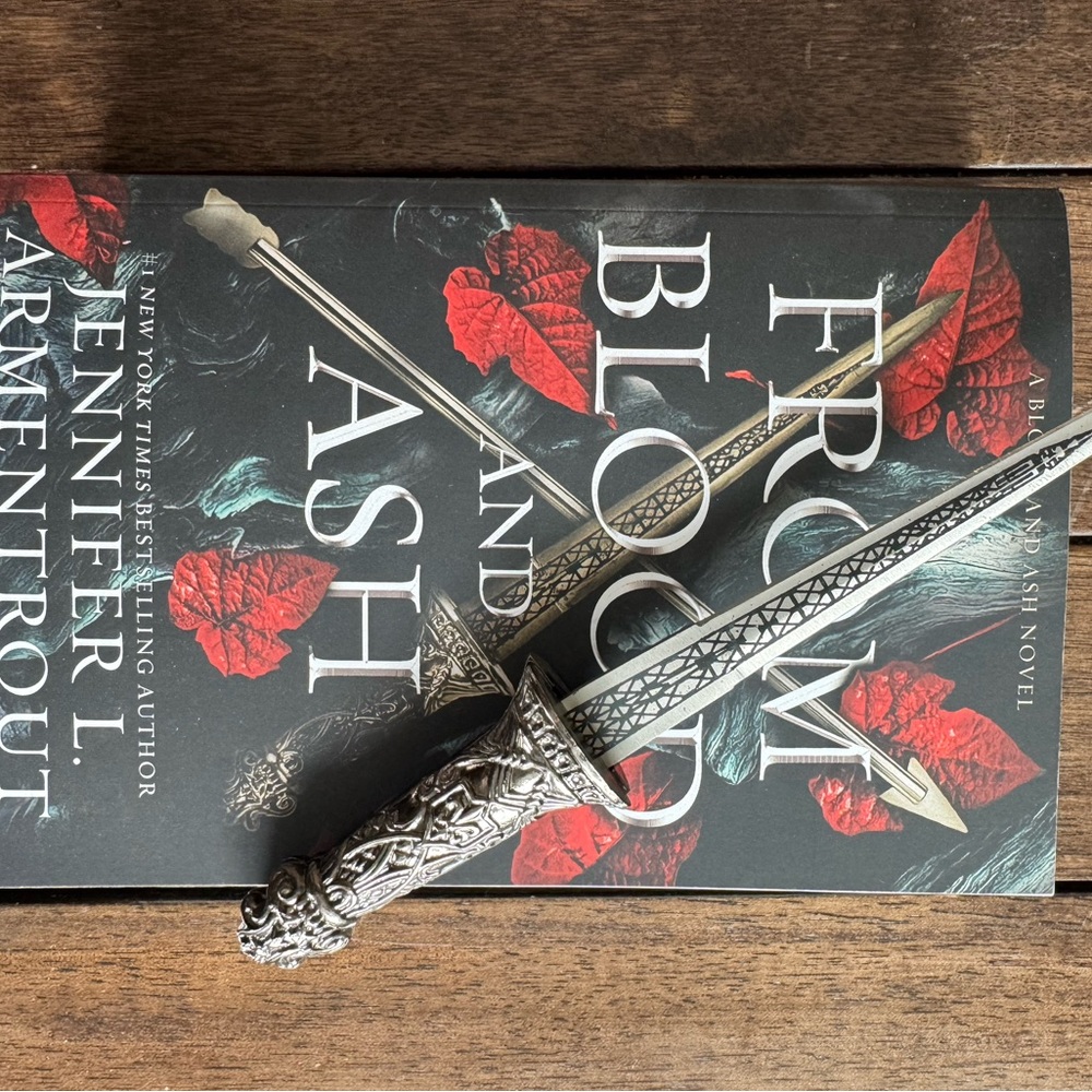 Decorative Silver Sword/Dagger Eiffel Tower stand letter opener.